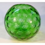 A mid-20thC retro green glass bowl, the circular body decorated with graduated circles on a plain