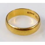 A 22ct gold plain wedding band, size J, 4.7g.