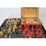 A quantity of various late 19thC ivory chess pieces, in white and red, to include 9cm high king, and