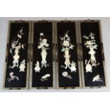 A set of four 20thC lacquer panels, each highly decorative and raised with mother of pearl finish