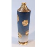 A Japanese Meiji period Satsuma vase, the tapering cylindrical body with blue ground broken with