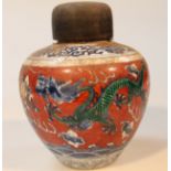 A Chinese porcelain Kangxi style ginger jar, with an associated hardwood lid, the shouldered body