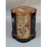 A 20thC Chinese lacquer finish and giltwood cabinet, with a shaped inverted top decorated with