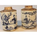 A pair of 18thC blue and white Chinese porcelain tea caddies, each shaped circular body, decorated