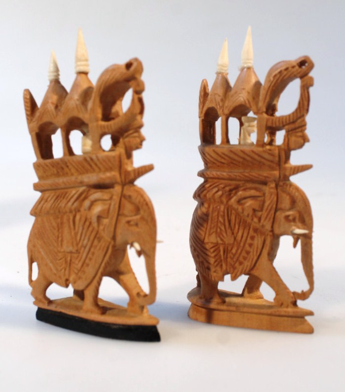 An Indian sandalwood chess set, the pieces carved as figures on the backs of elephants, camels and - Image 3 of 4