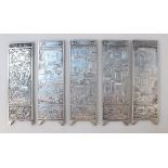 Five various 20thC Chinese screen panels, each repoussé decorated with scholars before buildings,