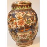 A Chinese porcelain polychrome decorated jar and cover, the shouldered body heavily enriched with