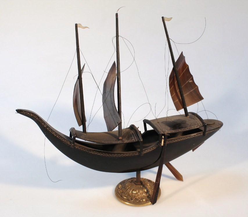 An early 20thC carved horn ship, with shaped masts and realistic decking on a cylindrical stem - Image 2 of 2