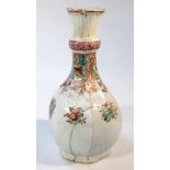 A Chinese porcelain Ming style vase, the shaped bulbous body polychrome decorated with an