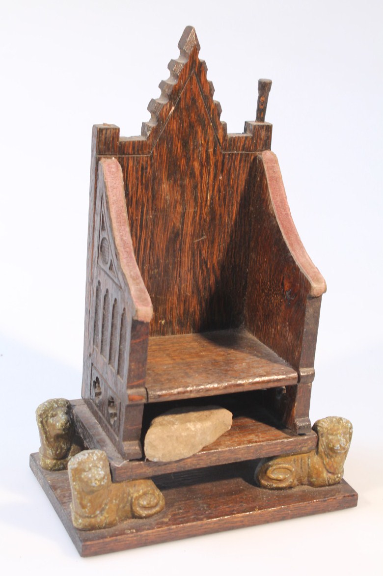 A mid-20thC oak Douglas Royal Commemorative replica Westminster Abbey seat, for the Coronation of