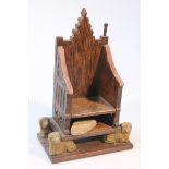 A mid-20thC oak Douglas Royal Commemorative replica Westminster Abbey seat, for the Coronation of