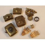 A quantity of various early 20thC brass vesta cases, to include novelty examples, etc, one centred