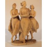 A 19thC alabaster figure group, of The Three Graces, each standing in flowing robes before tree