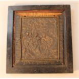 A 19thC cast metal relief plaque, raised with various semi clad figures before a bearded gentleman