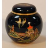 A Carltonware Bleu Royale ginger jar, with gilt highlights the bulbous body decorated with pagoda