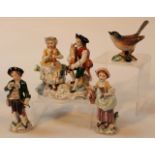 Various Continental porcelain Sitzendorf figures, to include a pair of a girl and boy dressed in