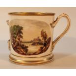 An late 18th/early 19thC porcelain loving cup, the cylindrical body decorated with panels of