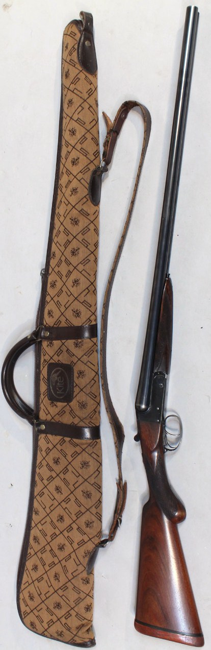 A BSA 12 bore side by side shotgun, serial number W557. Auctioneers note - Anyone wishing to view or