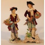 Two similar Continental Sitzendorf porcelain figures, the first a gentleman holding basket in