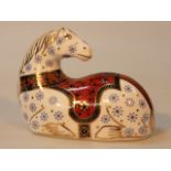 A Royal Crown Derby paperweight, recumbent horse, printed marks beneath with silver stopper, 12cm