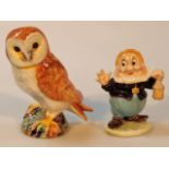 A Beswick Snow White figure, Happy, no. 1326, gold oval mark beneath, 11cm high and an owl, no.