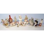 Various 19thC and later china, to include an Eastern figure with legs crossed, polychrome decorated,