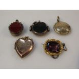 Two agate fobs, two lockets and a brooch with purple stone. (5)