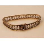 A 9ct gold meshwork bracelet, with gate clasp and pierced body, 18cm long, 17g.