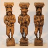 Three various heavily carved hardwood figures, of musicians, each with scroll sconce tops on