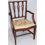 A 19thC mahogany Sheraton style carver chair, with a square back set with three diamond splats above