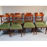 A set of 8 modern 19thC style mahogany finish dining chairs, each with overhanging curved top