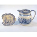 A 19thC blue and white transfer printed jug, of large proportion with a plain moulded beak spout and