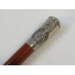 An early 20thC Queens Own Royal Glasgow Yeomanry swagger stick, with a polished wooden centre and