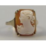 A cameo ring, claw set with a lady quarter profile on a yellow metal shank, marked 9ct. Size P.