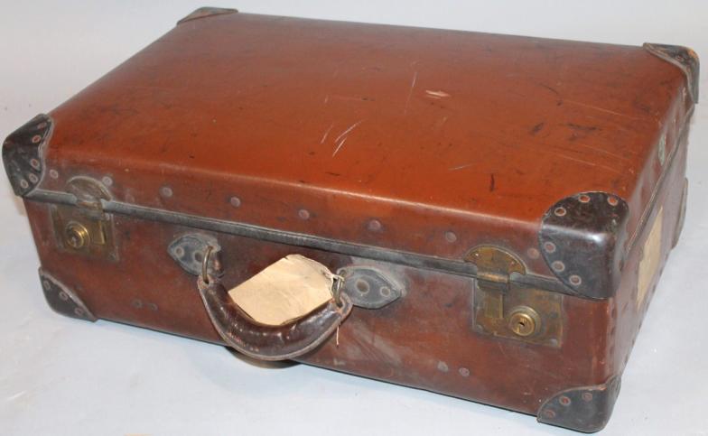 An early 20thC brown leather travelling case, by Orient BCM, with black studded trim and articulated - Image 2 of 4