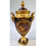 An early 20thC Coalport vase, the classical outline headed by a compressed domed lid with acorn