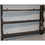 A set of 20thC Chippendale design hanging shelves, in three sections flanked by pierced stylized