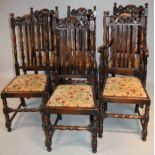 A set of six early 20thC (5 + 1) oak Carolean style dining chairs, each with arched backs flanked by