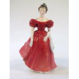 A Royal Doulton Figure, Winsome HN2220, printed marks beneath, 21cm high.