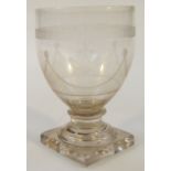 A Masonic etched and clear glass rummer, the bulbous bowl set with compass etc. with a part