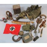 Various artillery and other bygones, to include a small swastika cloth flag on red ground, folding