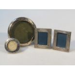 Four various 20thC silver frames, with easel backs, to include a circular example, 12cm dia.