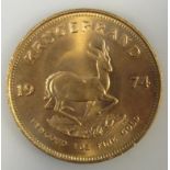 A 1974 gold krugerrand, 3.5cm dia, 34g.