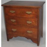 A 19thC oak chest, with three long drawers beneath an overhanging top raised on square supports,