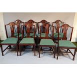 A set of eight 20thC mahogany finish Hepplewhite style shield back office boardroom chairs, each