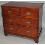 A late 19thC flat front chest, of two short and two long drawers, each with plate back handles