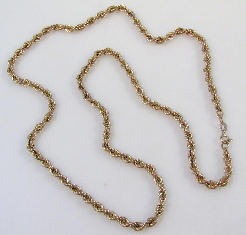 A rope twist necklace, hollow with plain clasp, yellow metal marked 375, 66cm long.