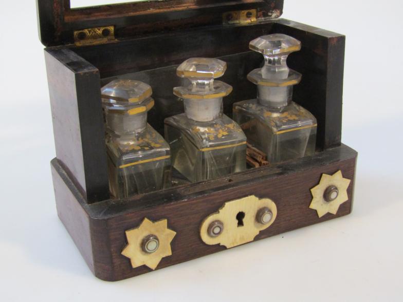 A 19thC rosewood three bottle travelling case, the exterior with bone inlay in a two sided glass - Image 2 of 2