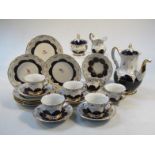 A 20thC Meissen Strewn Flowers pattern coffee service, comprising coffee pot, 27cm high, seven