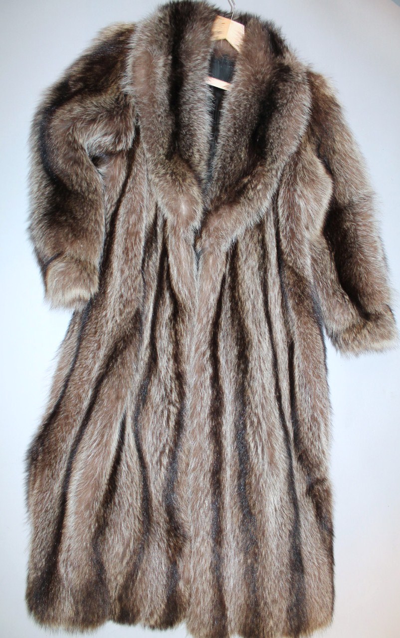 A late 20thC ladies three quarter length racoon fur jacket, with a black lining, size unknown.